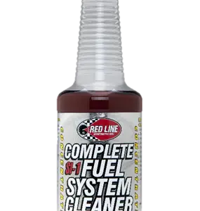 A 340ml bottle of Redline Oil SI-1 Fuel System Cleaner with a red cap, clear measuring neck, and a label describing its benefits for cleaning fuel systems and improving mileage.