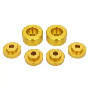 Six gold-coloured metal spacers, called "Import placeholder for 1436," are arranged in two rows on a white background. Each circular spacer features a central hole and comes in varying sizes.