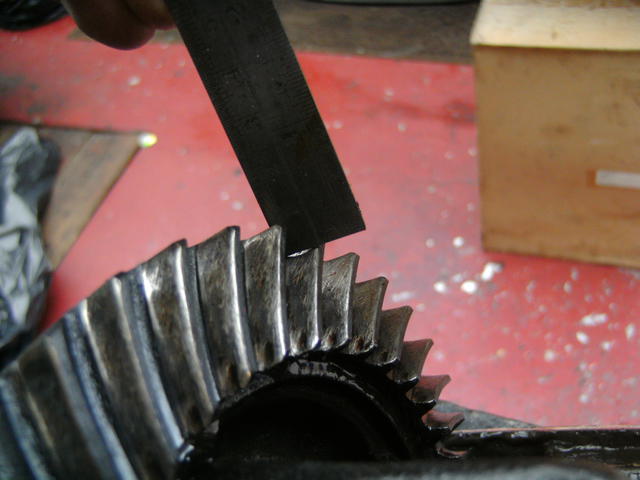 A close up of gears that have been run with no oil, causing them to scuff