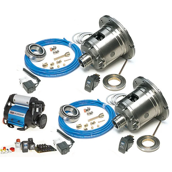 A set of automotive differential lockers, including two large metal differentials, blue wiring, a compressor, control switches, bearings, seals, fittings, and installation hardware, laid out on a white background.