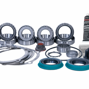 A Ford 9 Inch Rear Diff 1970-88 Bearing Master Fitting Kit, featuring bearings, gaskets, seals, bolts, and a tube of gasket maker, all arranged neatly on a white background.