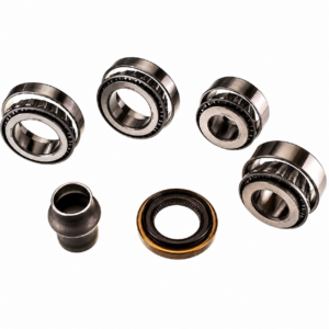 Five components from the Isuzu Dmax Rear Diff Bearing Kit, including metal bearings and a rubber seal, are arranged on a white background to display their various sizes and shapes, illustrating their typical use in automotive applications.