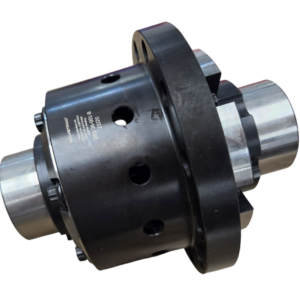 A close-up of a metal industrial component, possibly a coupling or differential, with a cylindrical shape, multiple bolts, and machined surfaces.