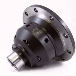 A close-up of a black and silver metal differential, used in automotive applications, with multiple holes around its flange and a polished shaft end, resting on a white background.